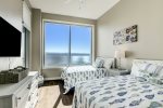 Second bedroom has two full size beds, wall mounted TV and endless views of the Gulf. 